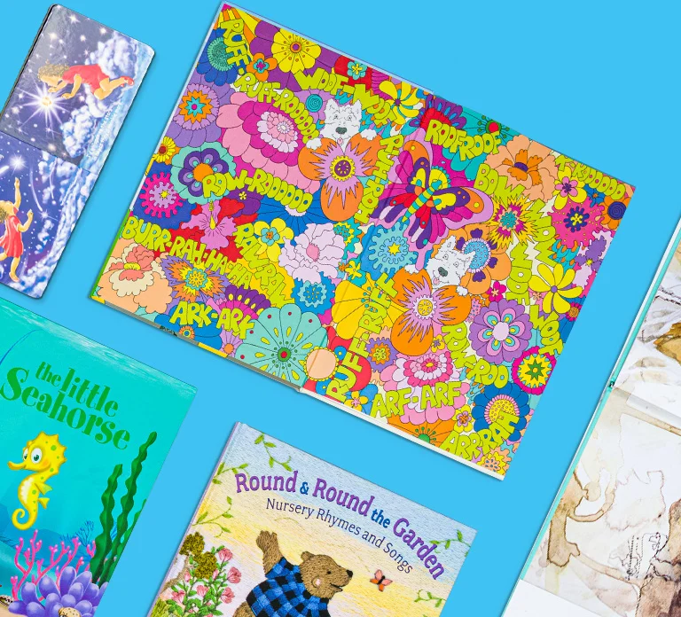 Colorful arrangement of open and closed children’s picture books